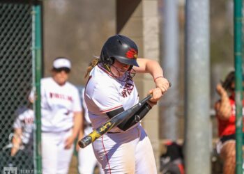 Softball Splits Battle for Wheeling on Big Offensive Day